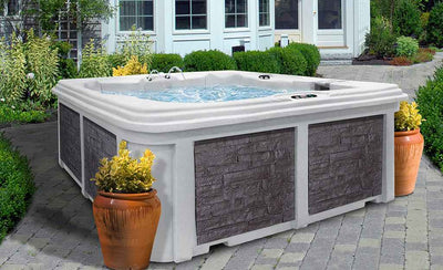 Aspen Spas Arcadia Extreme Series 7-Person Hot Tub – 70 Jets, 4 Pumps, Gecko Touchscreen with Wi-Fi, Made in USA
